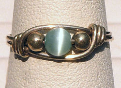 Sterling Silver Wire Wrapped Ring with Light Blue Cat's Eye