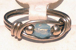 Sterling Silver Wire Wrapped Ring with Blue Facet Cut Bead