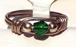 Sterling Silver Wire Wrapped Ring with Emerald Facet Cut Bead